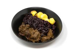 Traditional beef stew with apple beetroot salad and potato dumplings
