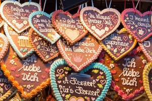 Traditional German heart-shaped gingerbread decorations for sale at Oktoberfest