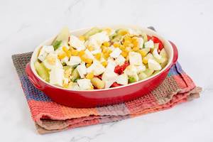 Traditional Salad with Tomatoes Paprika Corn and Cheese