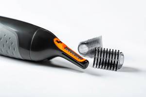 Trimmer and nozzle book on white background