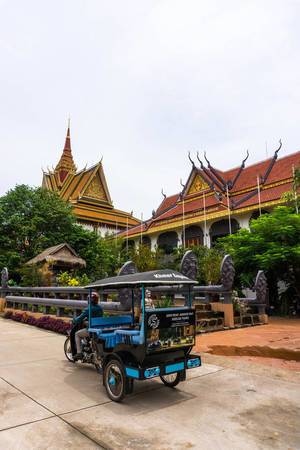 Tuk Tuk in front of Preah Prom Rath Temple in Siem Reap
