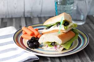 Turkey Sandwich with Salad and Black Olive