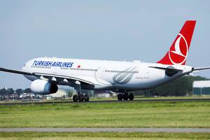 Turkish Airlines plane taking off from Amsterdam Airport