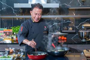 TV-Chef Martin Yan cooks in front of live audience on the IFA cooking stage