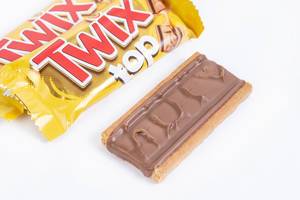 Twix Top chocolate bar above white background