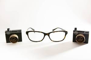 Two camera crafts and reading glasses