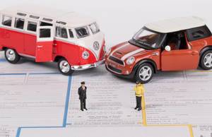 Two classic toy car on accident statement report