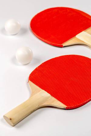 Two rackets for playing table tennis on white background