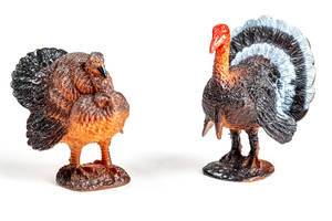 Two Turkey figures on a white background