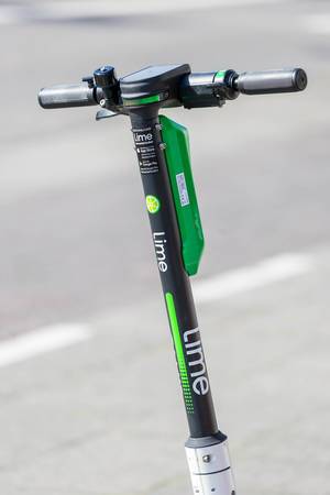 Urban mobility with electric scooter sharing app Lime