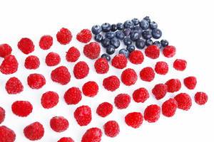 USA flag made of blueberries and raspberries, white background (Flip 2019)