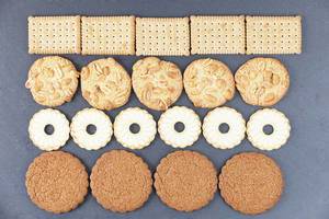 Various shapes of biscuits, dark background