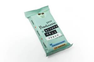 Veganer Schokoriegel von HaselHerz aus Fairtrade Kakao und ganzen Haselnüssen, als laktosefreier Snack