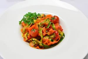 vegetable pasta with herbs and tomatoes
