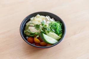 Veggie Bowl with tofu, pineapple and various vegetables  - close up
