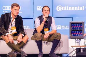 Venture capitalists Christian Saller and Christopher Steinau intervene during the startup pitch finals at #bits19
