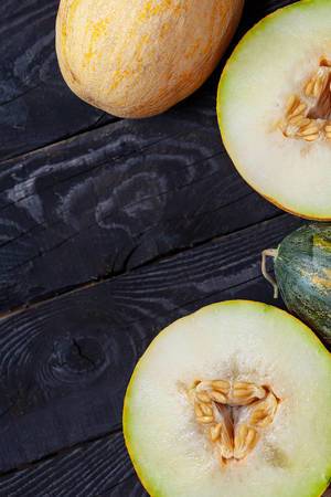 Vertical photo of sweet melons with copy space