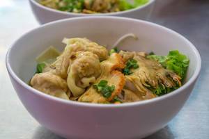 Vietnamese Noodle Dish with Dim Sum and Pork
