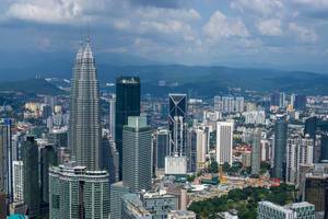 View of Jalan Ampang District with Petronas Twin Towers from KL Tower in Kuala Lumpur
