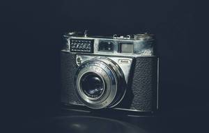 Vintage camera on black backround