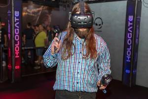 Visitor playing Hologate with HTC Vive VR Headset and Controllers