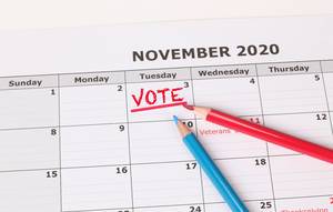 Vote reminder in calendar with red and blue pen