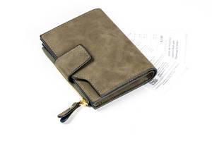 Wallet-with-receipts-on-a-white-background-concept-of-monetary-expenses-payment.jpg