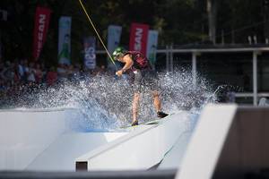 Water skiing man in front of audience
