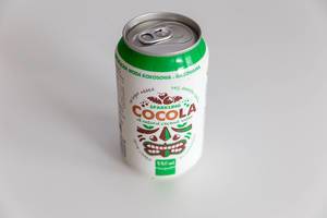 White Cocola, Polish refreshing drink with natural coconut water in a closed can