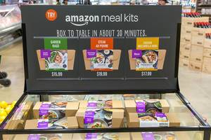 Whole Foods Market sales different meal kits by amazon with all ingredients for Garden Ragù, Steak au Poivre and Chicken Mozzarella hero in boxes