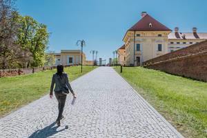 Woman walking in front of Austerlitz palace