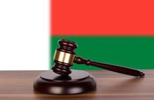 Wooden gavel and flag of Madagascar