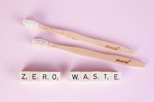 Wooden toothbrushes with zero waste text