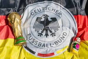 World Cup Trophy, German flag and babushka doll