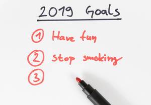 Writing 2019 goals on a paper