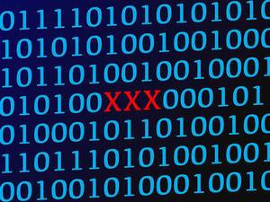 XXX red text between blue binary data on screen