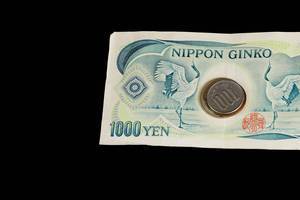 Yen, Japanese banknotes and coins, black background