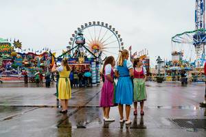 Young ladies dressed in national colorful dresses for Oktoberfest