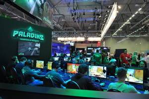 Young people playing Paladins: Champions of the Realm at the Gamescom fair in Cologne