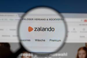 Zalando logo on a computer screen with a magnifying glass