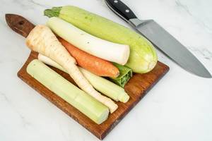 Zucchini Carrot and Parsnip on the wooden cutting board (Flip 2019)